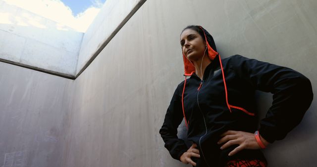 Determined Woman Standing in Concrete Urban Structure - Download Free Stock Images Pikwizard.com