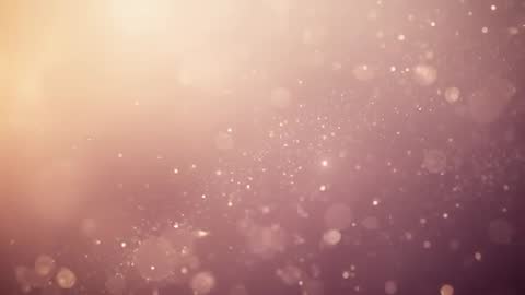 Drifting Warm Bokeh Particles Video Loop with Soft Left Glow and Shimmering Dust