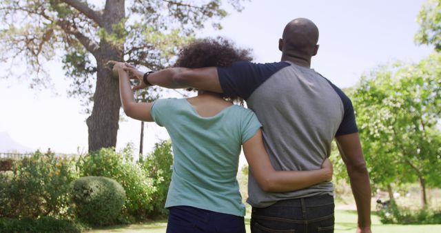 Couple Embracing and Enjoying Nature View in Sunshine - Download Free Stock Images Pikwizard.com