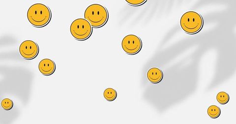 Cheerful smiley emojis with leaf shadows background