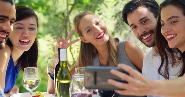 Friends Taking a Group Selfie During Outdoor Summer Picnic - Download Free Stock Images Pikwizard.com