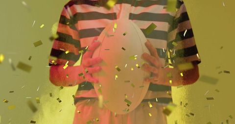 Celebratory Rugby Scene with Dynamic Confetti Background