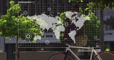 Urban commuter standing with bicycle and satchel with world map data overlay and global network