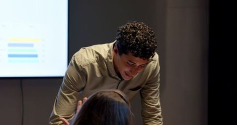 Candid Team Collaboration in Late-Night Office Meeting