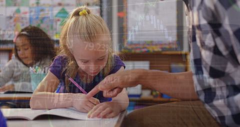 Teacher Assists Young Girl in Classroom with Financial Data Overlay