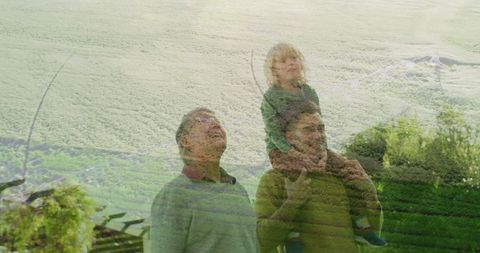 Generational Bonding in Nature with Kite in Meadow