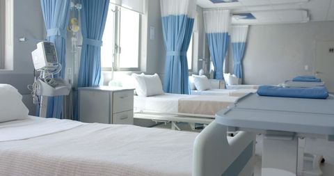 Empty Hospital Ward with Freshly Made Beds and Medical Equipment - Download Free Stock Images Pikwizard.com