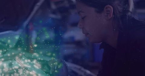 Female Technician Sculpting Metal with Precision in Workshop