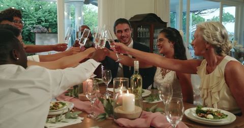 Elegant Wedding Reception with Joyful Guests Toasting