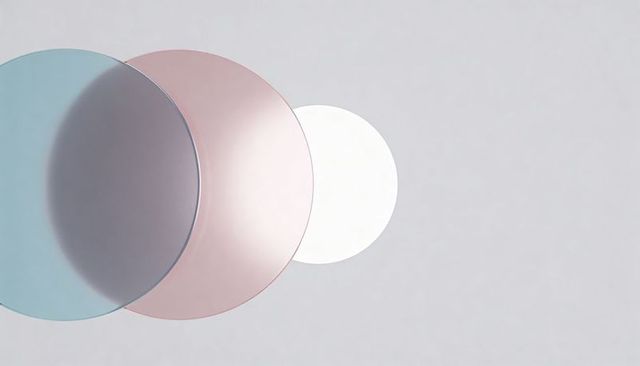 Overlapping cyan pink white disks casting soft shadows on pale gray minimal background