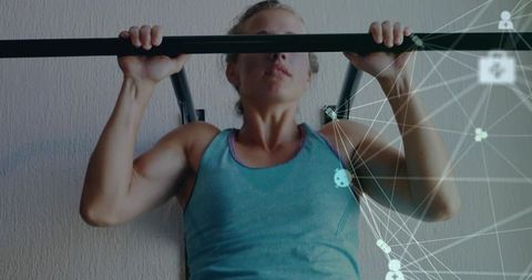 Athletic Woman Performing Pull-Up on Wall Bar with Abstract Network Overlay for Tech Fitness