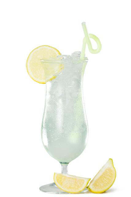 Glass of a cocktail with lime on white background