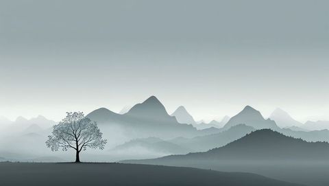 Solitary tree on misty hill with layered mountain view
