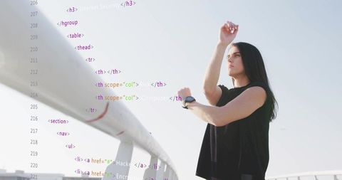 Woman checking smartwatch on urban bridge with code overlay and minimalist horizon