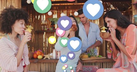 Social Media Engagement with Friends at a Tropical Beach Bar