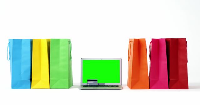 Colorful Shopping Bags and Laptop with Green Screen for Online Shopping Concept - Download Free Stock Images Pikwizard.com