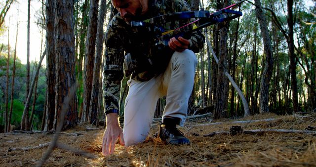 Hunter Tracking Deer Trail in Forest at Dusk - Download Free Stock Images Pikwizard.com