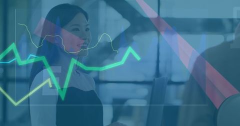 Business Team Discussing Financial Growth Analytics with Digital Interface