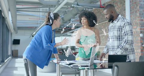 Diverse Team Analyzing Global Currency Data in Modern Office