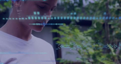 Preteen in garden with futuristic data overlays concept