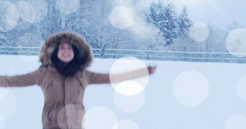 Joyful Woman Celebrating in Snowy Winter Wonderland - Download Free Stock Images Pikwizard.com