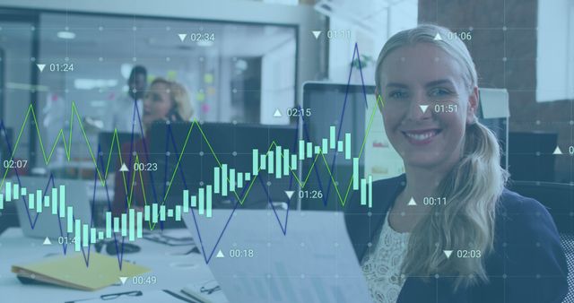 Smiling businesswoman analyzing data with digital graphs in modern office - Download Free Stock Images Pikwizard.com