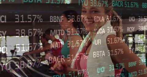 Women Jogging on Treadmills with Digital Data Overlay in Gym