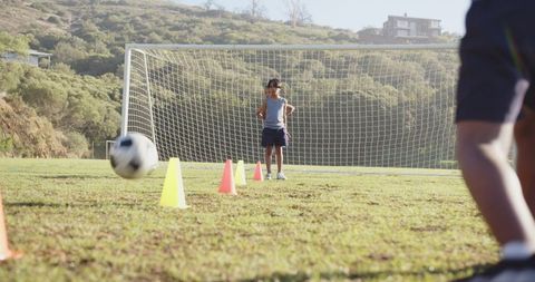 Kids Education Game Soccer Practice on Green Field Outdoors