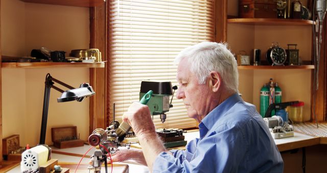 Elderly Man Crafting with Precision Tools in Workshop - Download Free Stock Images Pikwizard.com