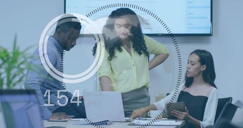 Innovative business team analyzing data with futuristic interface