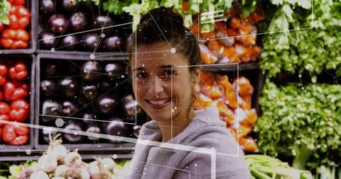 Woman Shopping in Produce Aisle with AR Technology