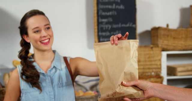 Woman Smiling Collecting Order in Grocery Store - Download Free Stock Images Pikwizard.com