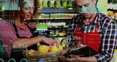 Retail staff checking inventory on tablet while sorting oranges with digital data overlays