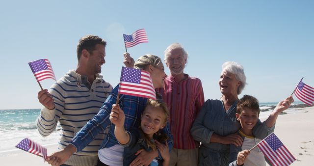Happy Multi-Generational Family Holding American Flags on Beach - Download Free Stock Images Pikwizard.com