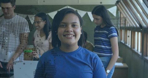 Smiling teen girl leading classroom groupwork, diverse students collaborating in daylight