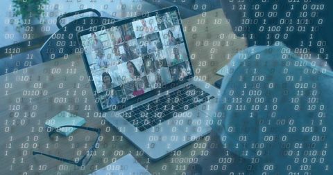 Remote Team Connecting via Video Conference on Laptop with Digital Binary Overlay