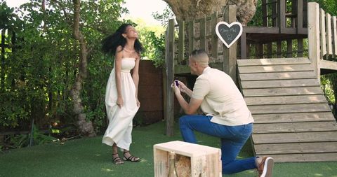 Romantic proposal in serene garden setting