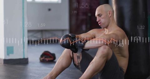 Boxer Adjusting Gloves in Gym with Dynamic Data Overlay