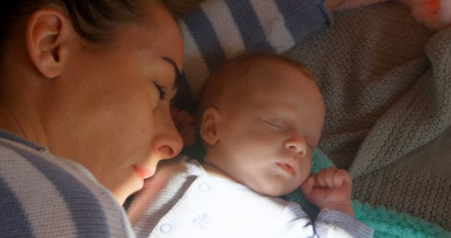 Mother Sleeping Next to Newborn Baby in Cozy Blanket - Download Free Stock Images Pikwizard.com