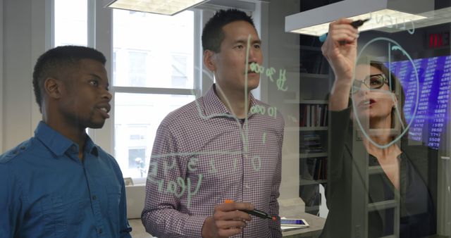 Diverse Team Brainstorming on Transparent Board in Modern Office - Download Free Stock Images Pikwizard.com