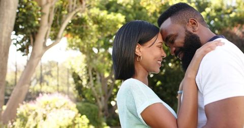 Romantic Couple Embracing in Garden Serenity