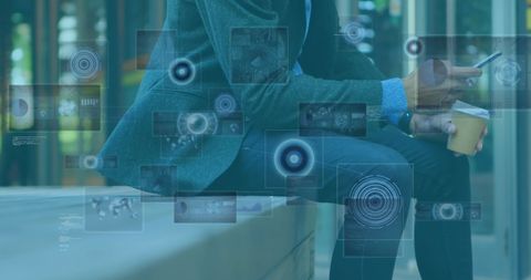 Businessman Using Smartphone with Digital Interfaces