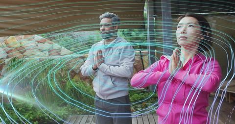 Couple in Meditation with Digital Energy Fields Surrounding Them