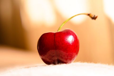 Red delicious cherry for warm cherry background