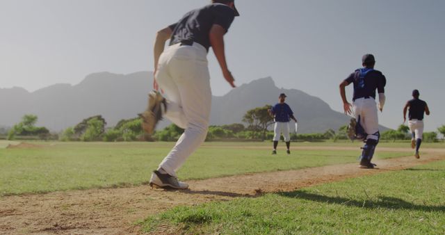 Baseball Players Running Bases on Sunny Day - Download Free Stock Images Pikwizard.com