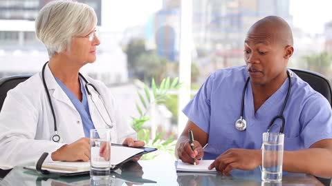 Doctors Collaborating in Modern Hospital Office