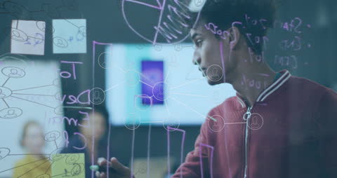 Businessman Analyzing Network on Transparent Board