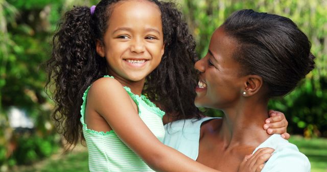 Happy Mother and Daughter Smiling in Park on Sunny Day - Download Free Stock Images Pikwizard.com