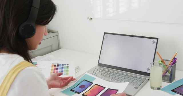 Creative Web Designer Working on Mobile App Interface with Color Palette - Download Free Stock Images Pikwizard.com