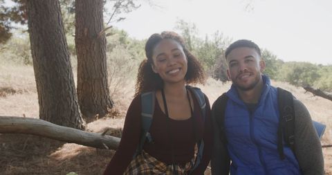 Happy Couple Exploring Serene Forest Trail